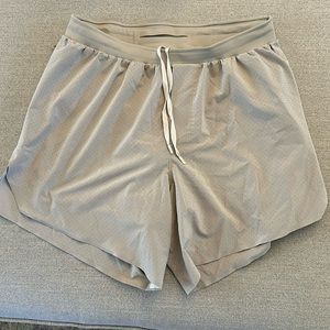 Men’s tan Lululemon Running shorts medium